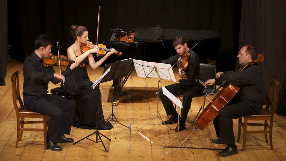 Music students play string quartet at summer music camp